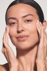 Dr. Hauschka size comparison 1.7 fl oz beside common objects for travel-friendly convenience