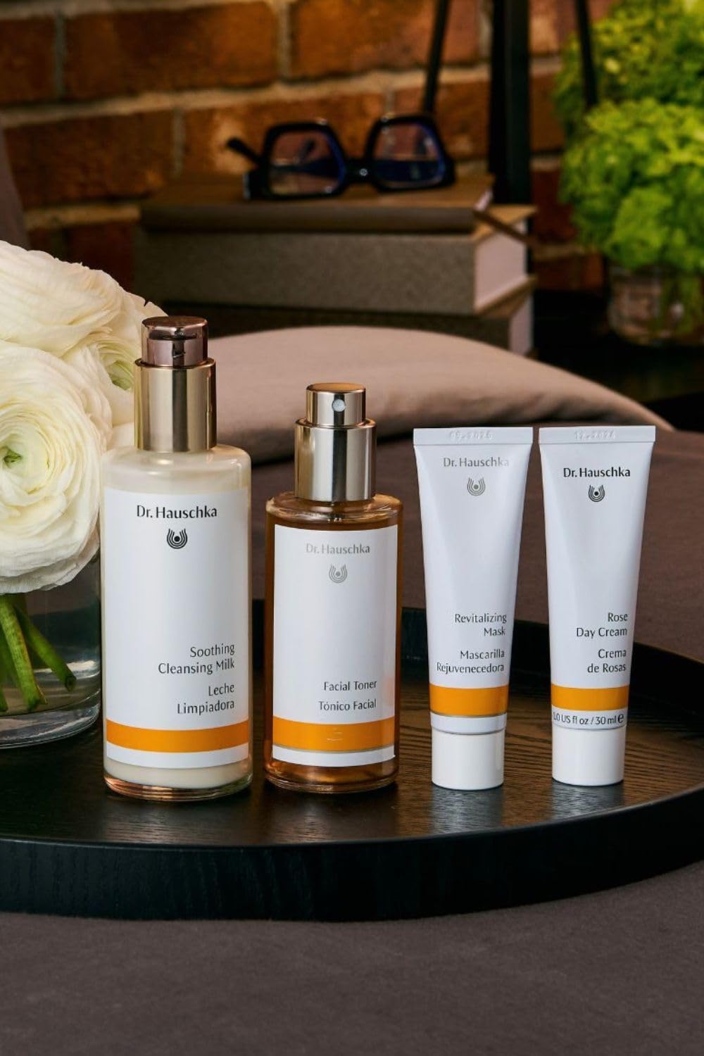 Dr. Hauschka size comparison in hand showing travel-friendly 1.0 fl oz benefit