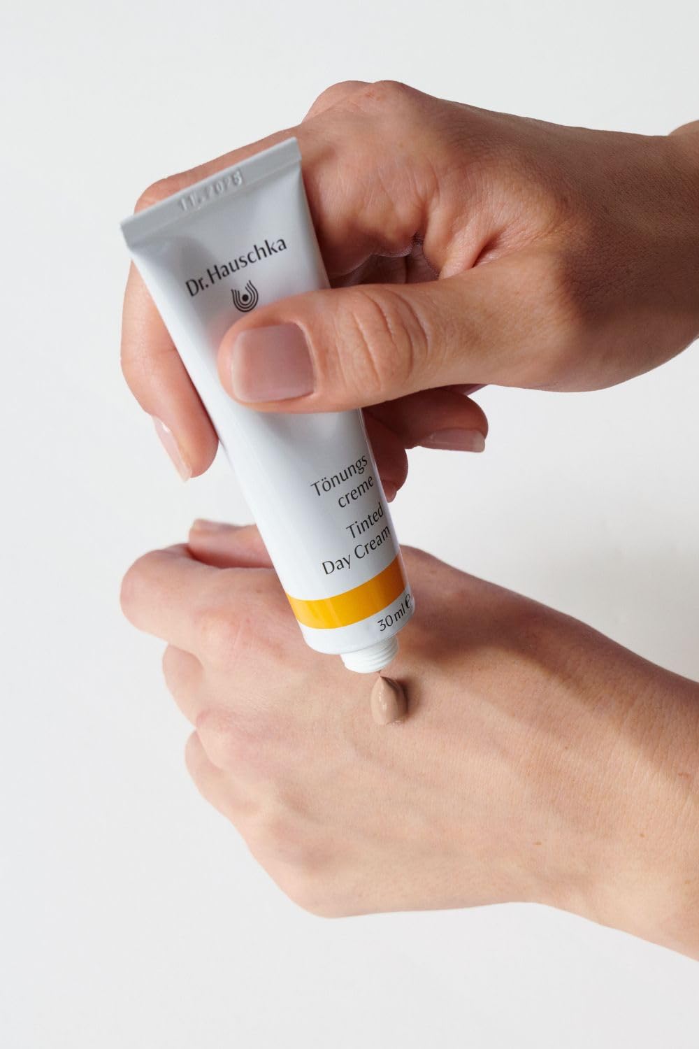 Dr. Hauschka applied on cheek showing natural, even tint