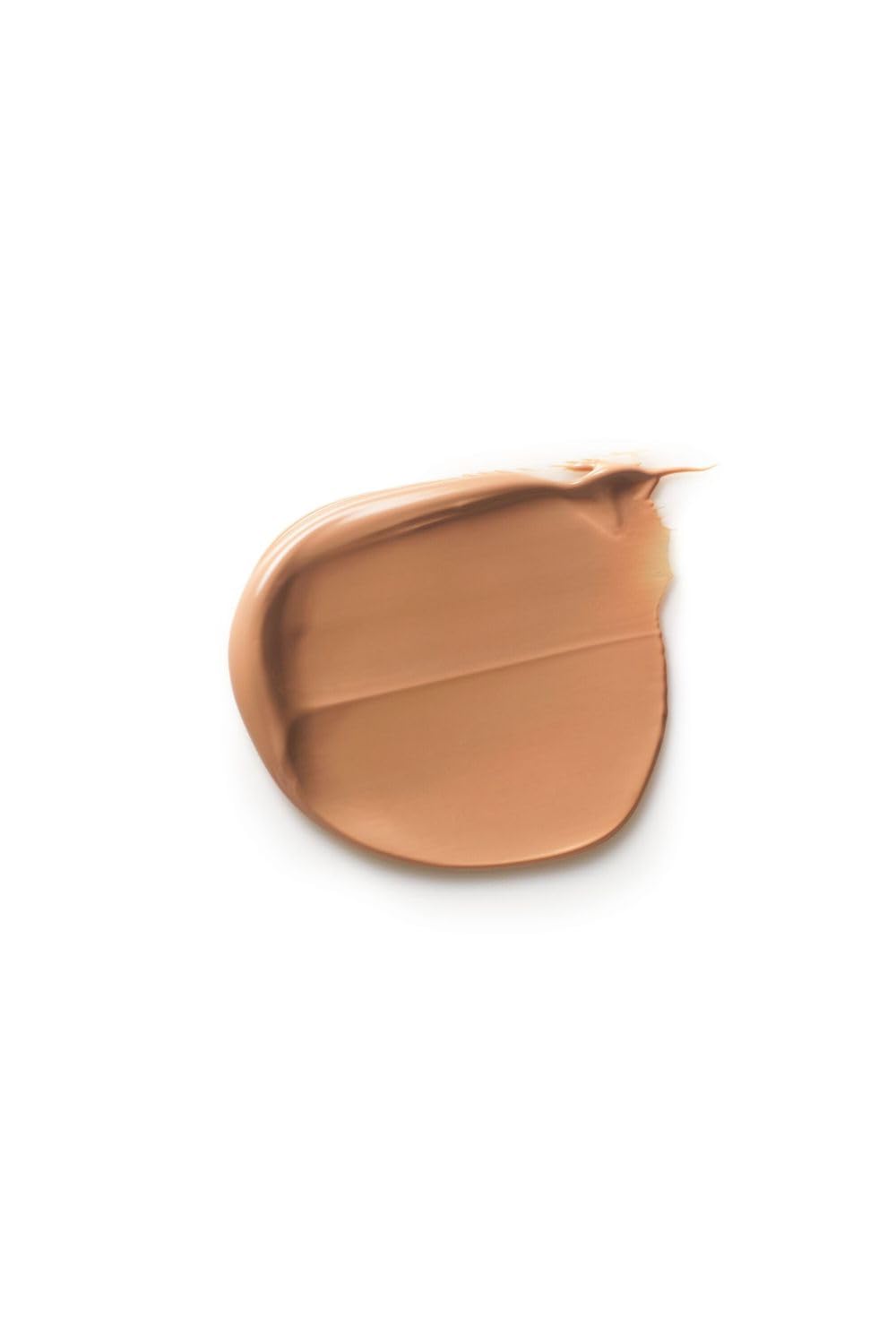 Dr. Hauschka tube held in hand demonstrating size and portability