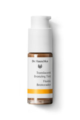 Dr. Hauschka bottle front view showing branding and compact packaging for travel
