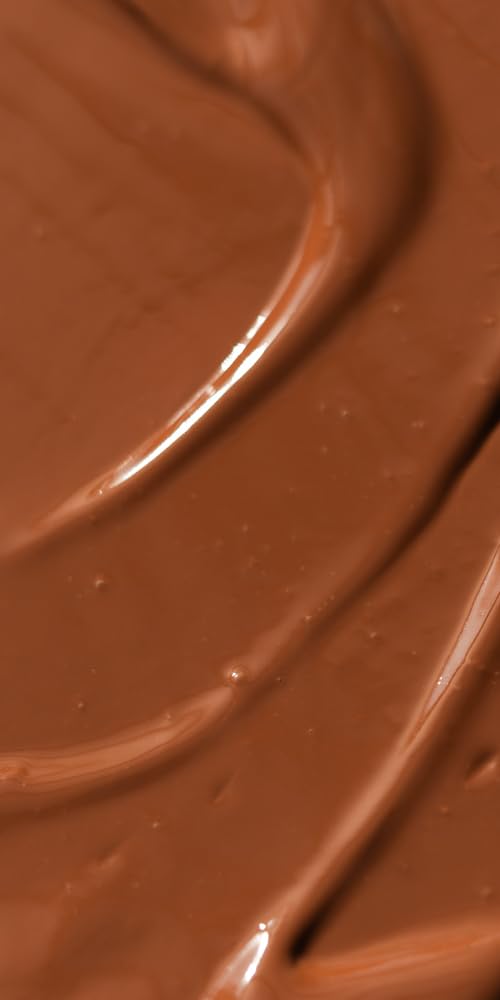 Dr. Hauschka pump dispensing bronzing tint illustrating controlled, mess-free application