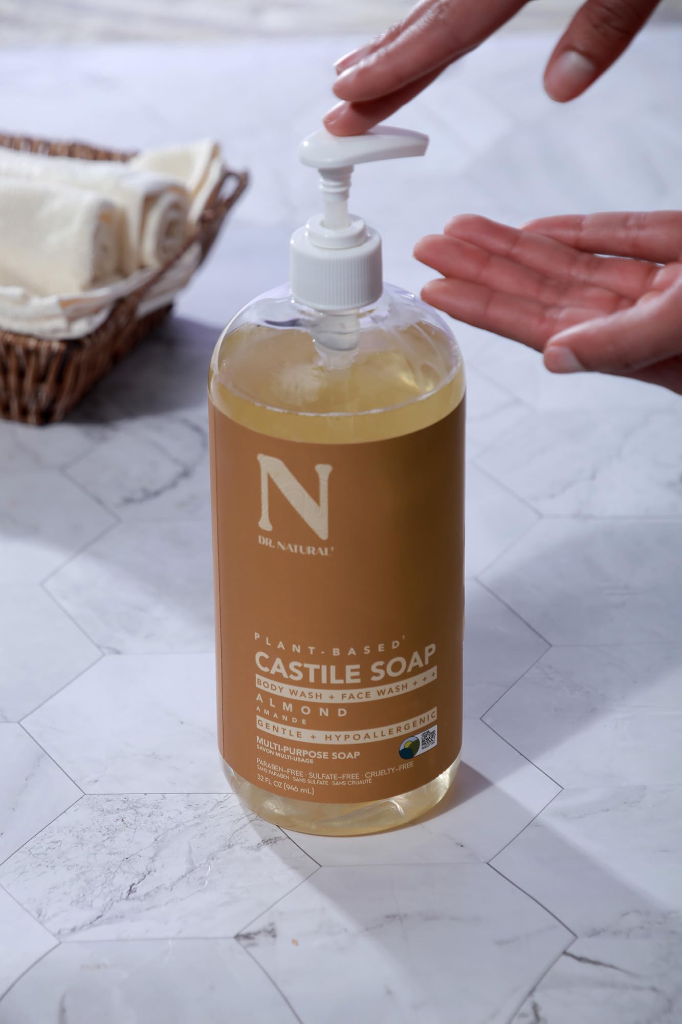 Pet being rinsed with Dr. Natural almond soap for gentle clean coat