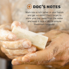 Dr. Squatch bar in hand demonstrating 5oz size and solid, long-lasting feel