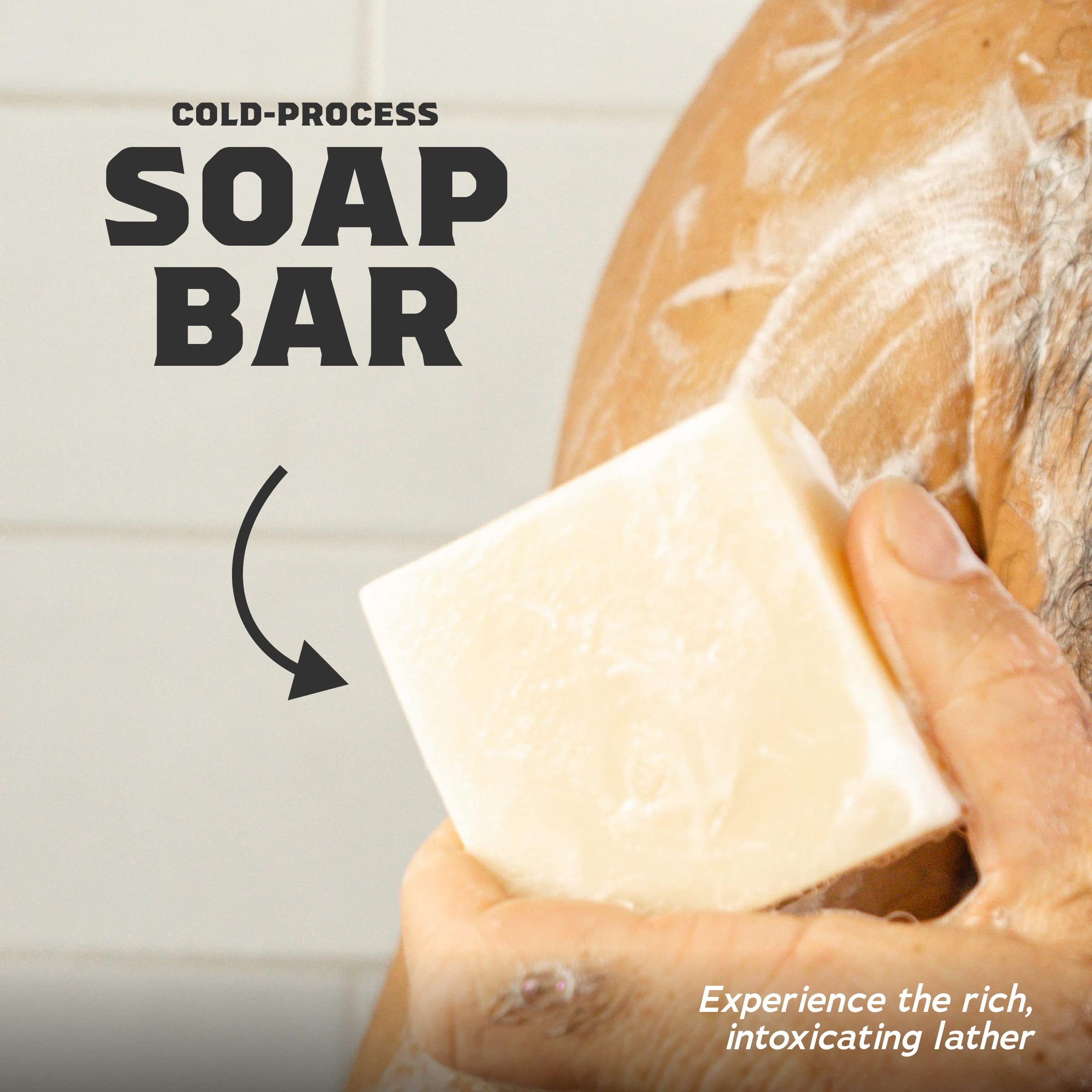 Dr. Squatch bars held in hand to show 5oz size and convenient travel benefit