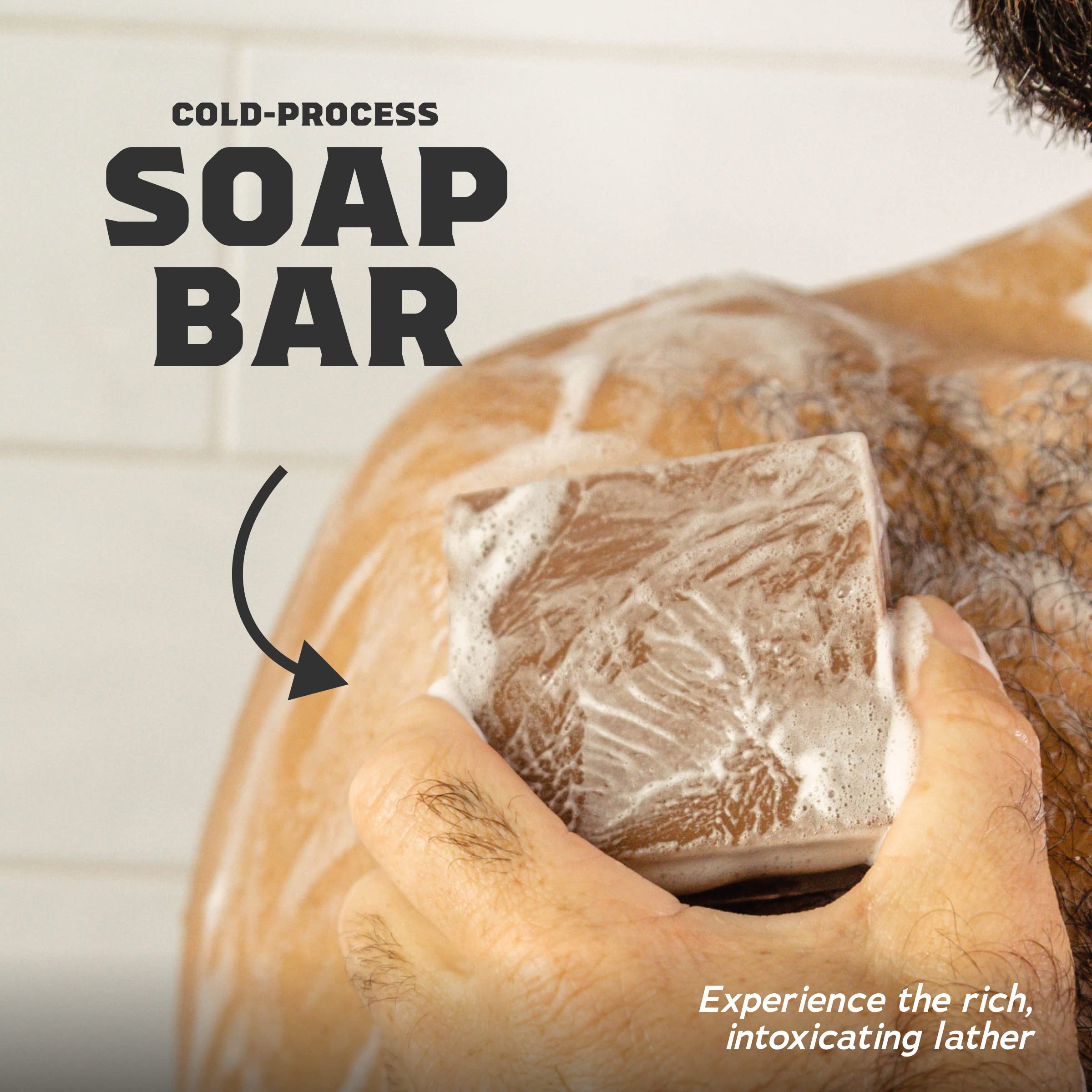 Dr. Squatch bar in shower hand use illustrating grip and sudsing benefit