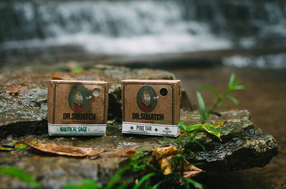Outdoor lifestyle shot with Dr. Squatch soap evoking woodsy, adventurous scent