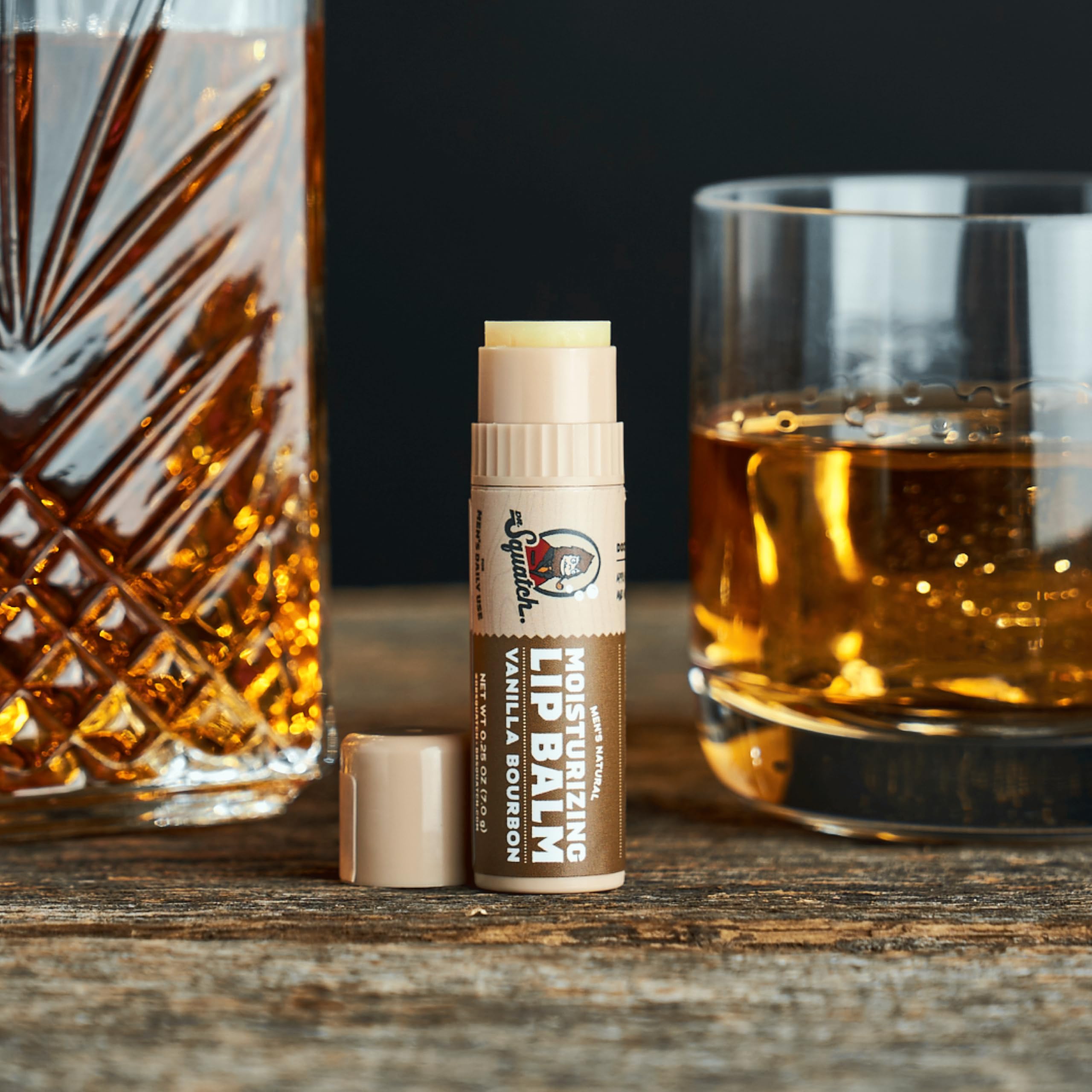 Dr. Squatch Vanilla Bourbon lip balm tube providing moisturizing lip protection