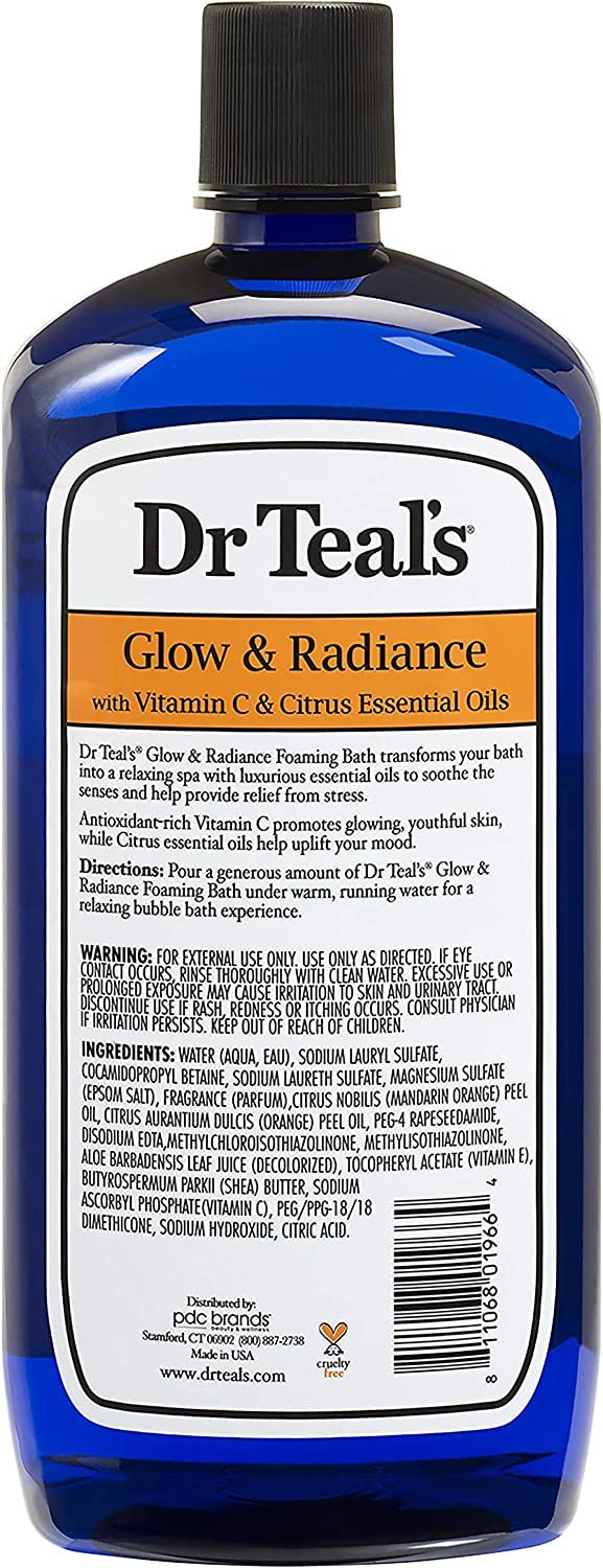 Dr Teal's bottles staged by tub illustrating a relaxing spa soak