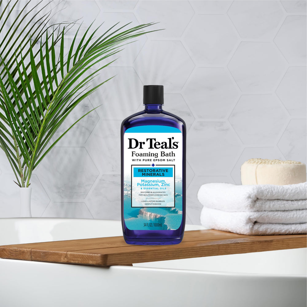 Dr Teal's bottle beside tub in a calm bathroom setting benefit