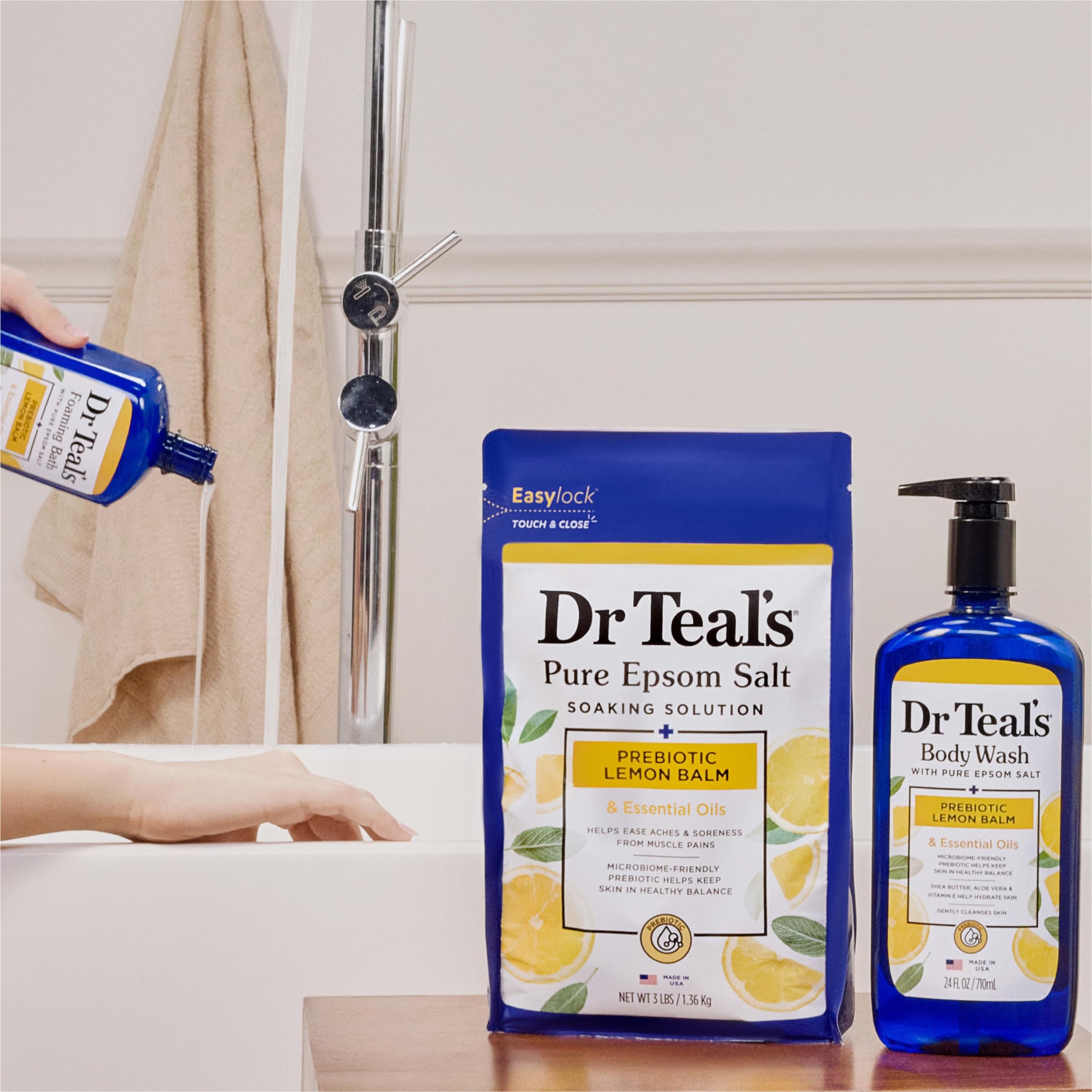 Lemon balm sprigs beside Dr Teal's bottle to show prebiotic ingredient focus