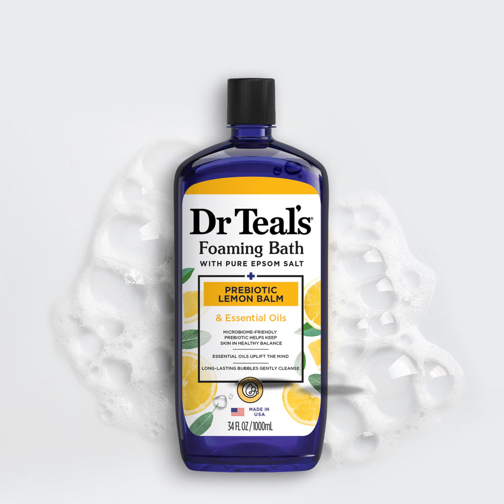 Four Dr Teal's bottles stacked to display the multi-pack value and supply