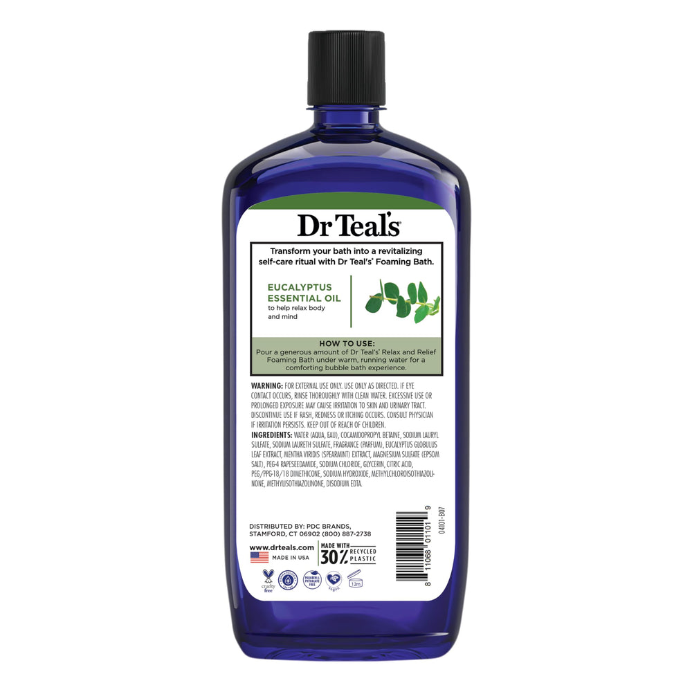 Dr Teal's bottle with eucalyptus and spearmint leaves to show aromatic oils