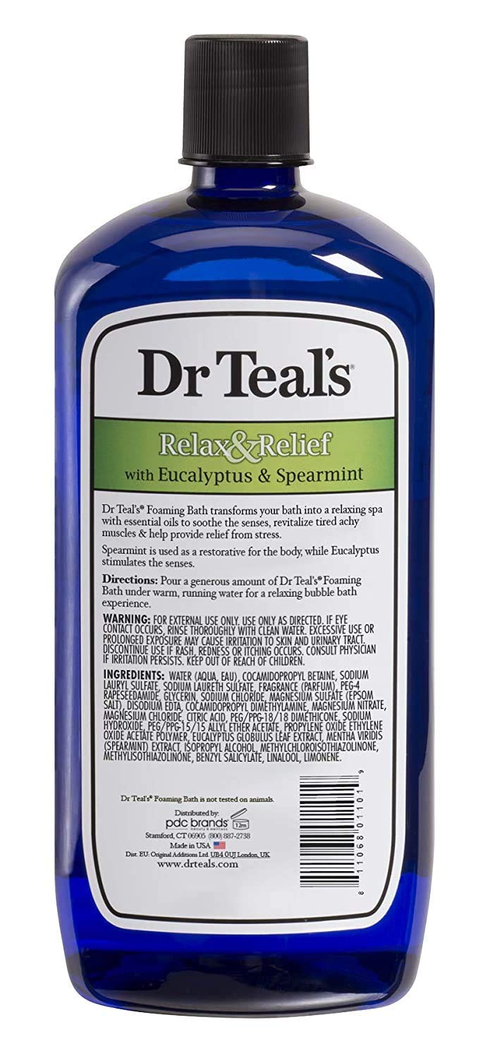 Dr Teal's label close-up highlighting ingredients and clear essential oil benefits