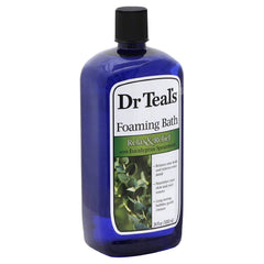 Dr Teal's bottle held in a hand to show 34 oz scale and easy-grip design