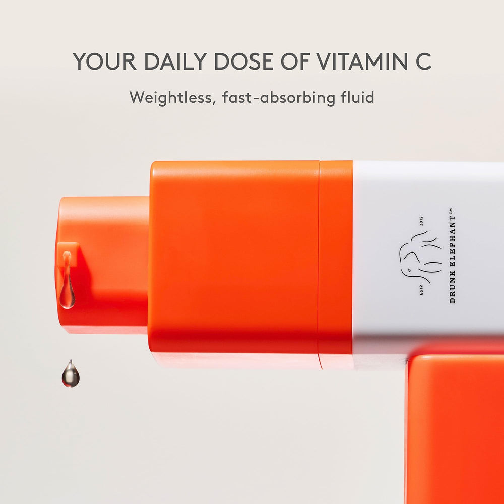 Drunk Elephant bottle next to sunscreen in a morning routine, emphasizes daytime protection