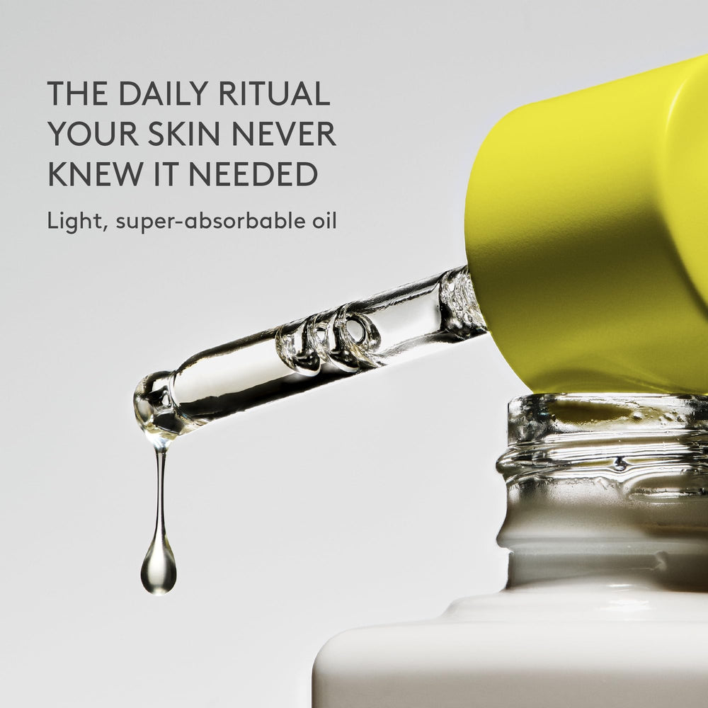 Drunk Elephant marula oil texture on skin highlighting fast absorption and glow