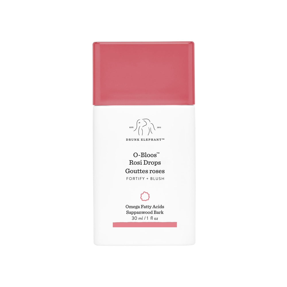 Drunk Elephant front bottle shot showing peachy-pink serum and clean packaging benefit: clear product info