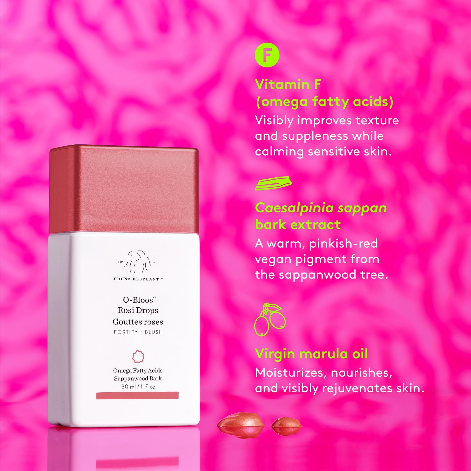 Drunk Elephant drops blended into moisturizer in palm showing how it mixes for buildable color benefit