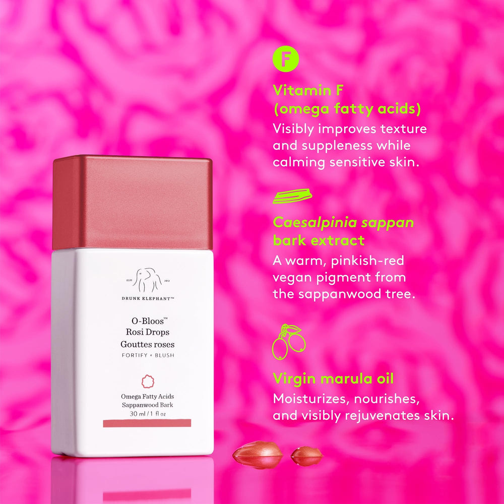 Drunk Elephant drops blended into moisturizer in palm showing how it mixes for buildable color benefit