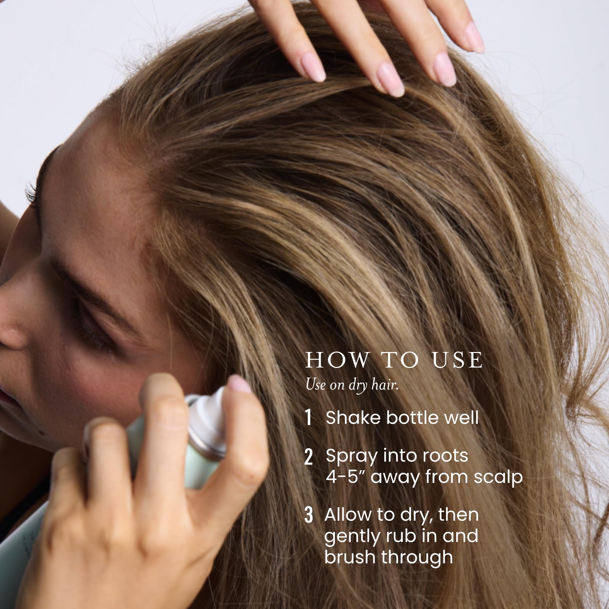 Drybar Detox in hand to show 3.8 oz size and travel convenience