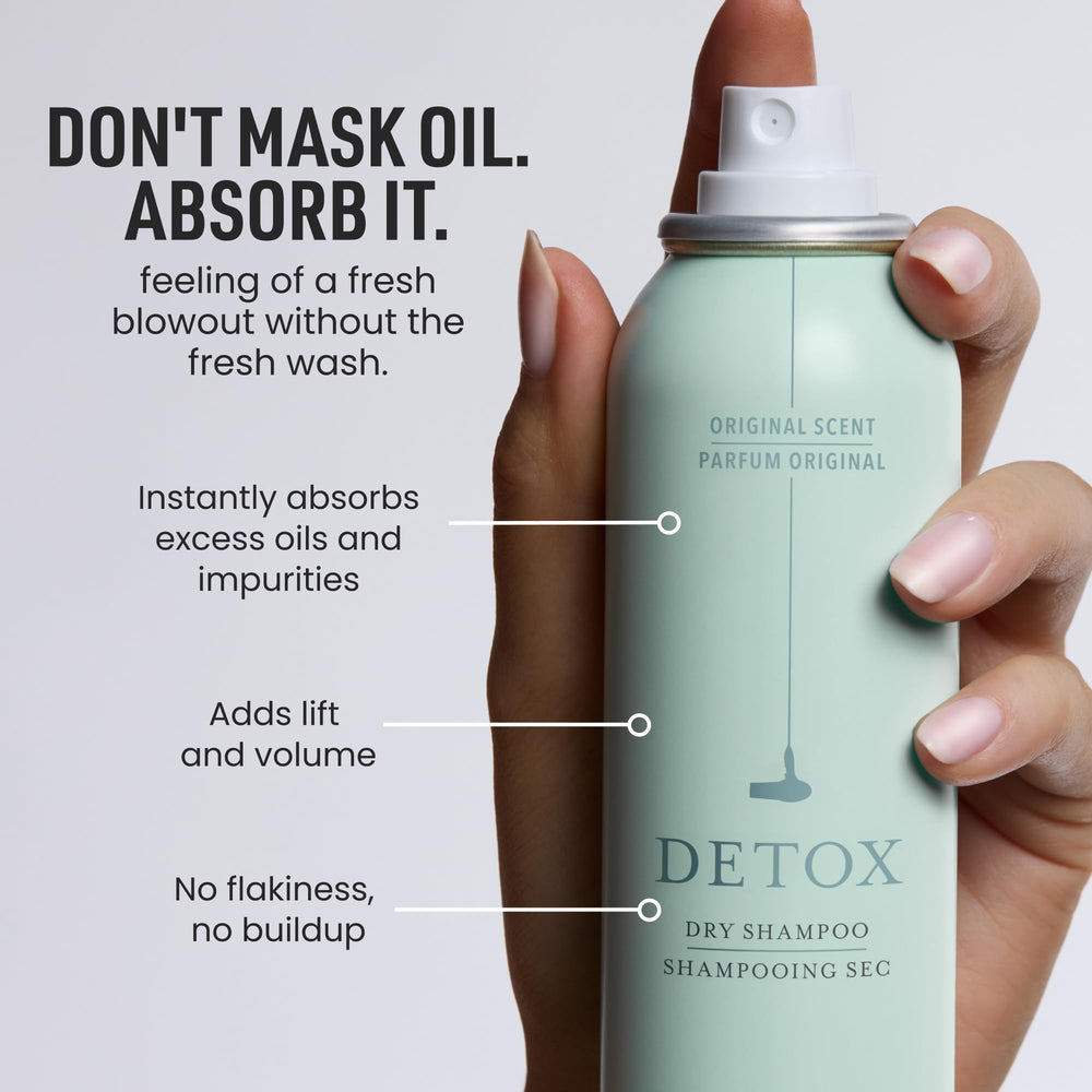 Spray texture close-up showing Drybar formula fog for fast oil absorption benefit