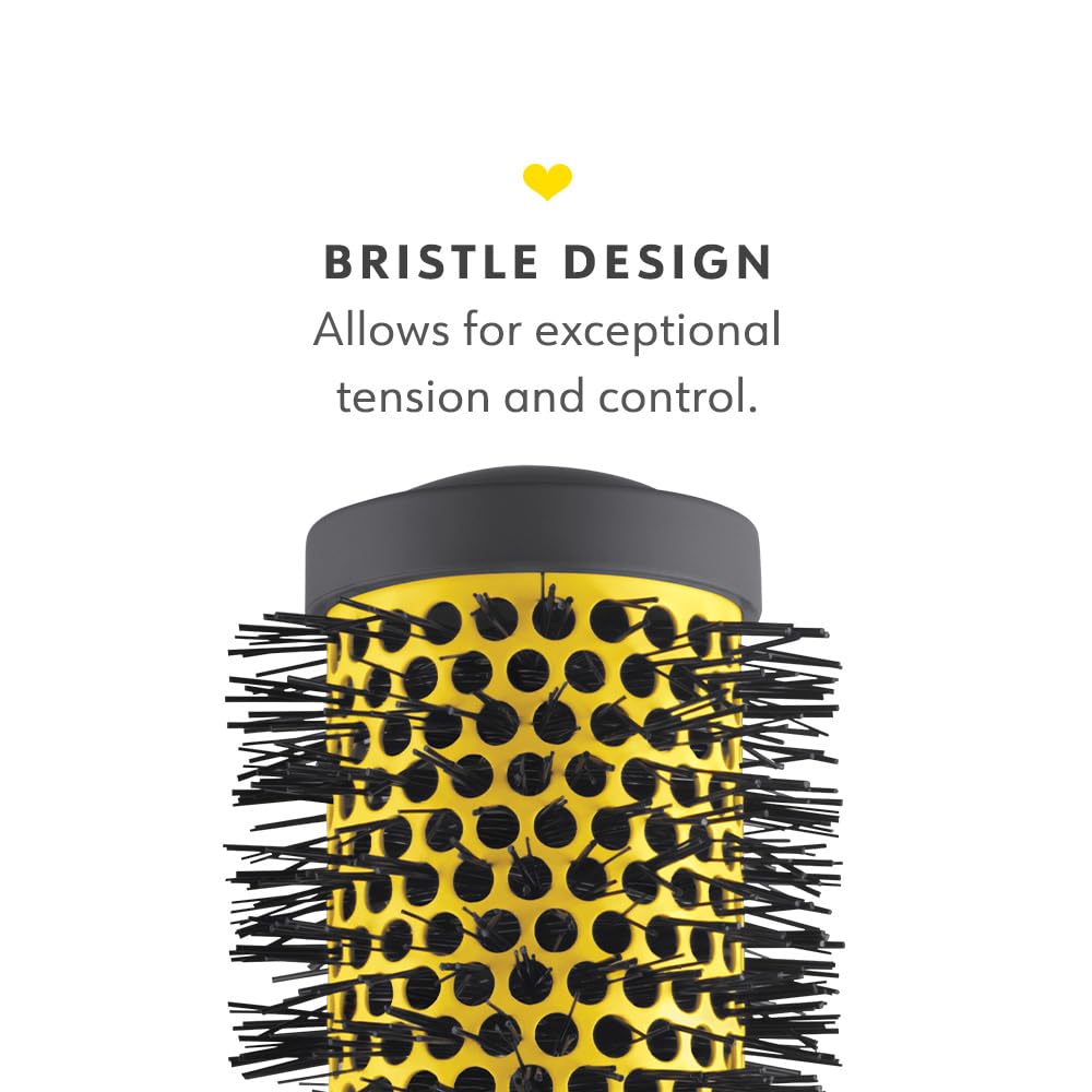 Drybar brush in use with hair dryer creating voluminous, frizz-controlled results