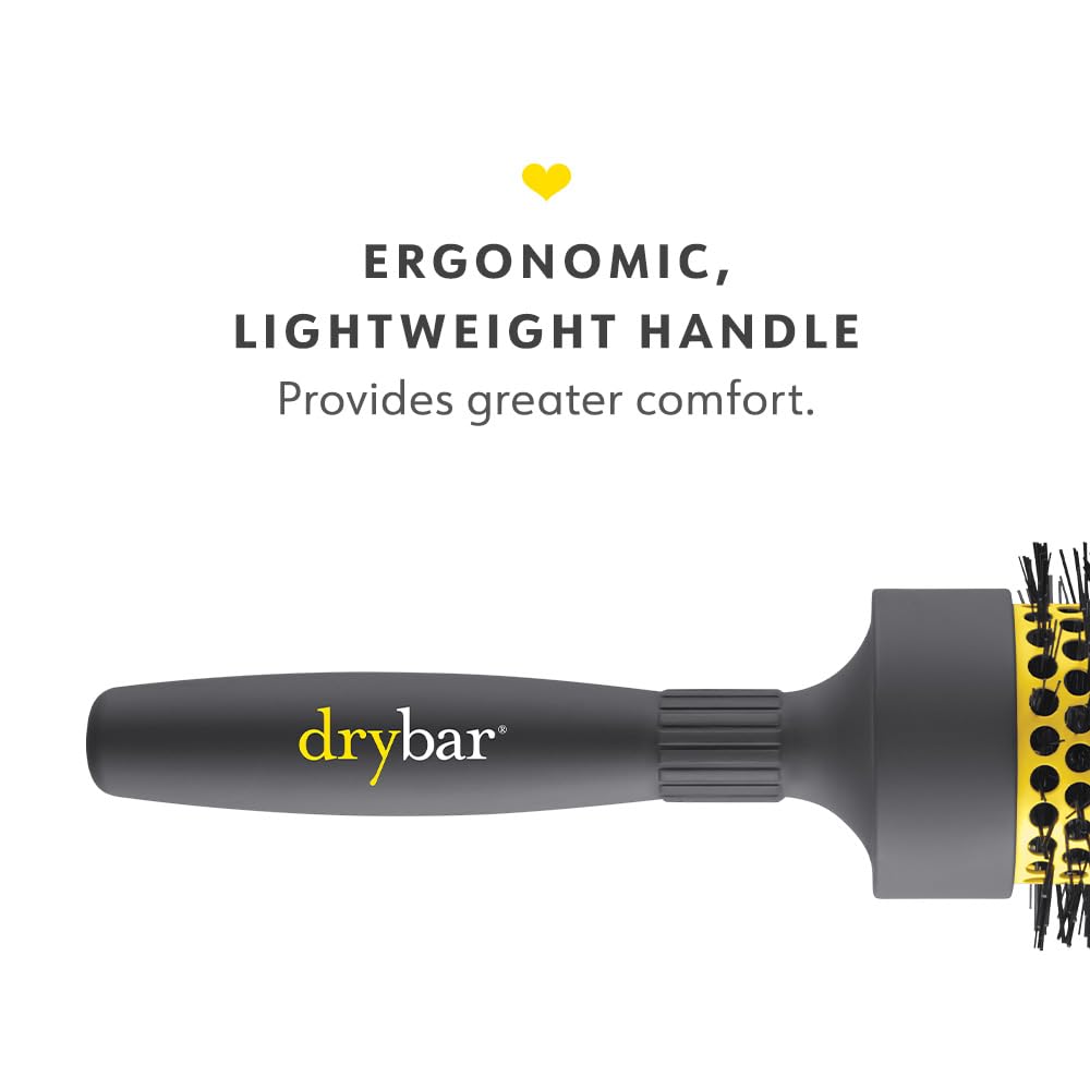 Drybar brush beside a ruler showing 2.75 inch barrel for scale and styling