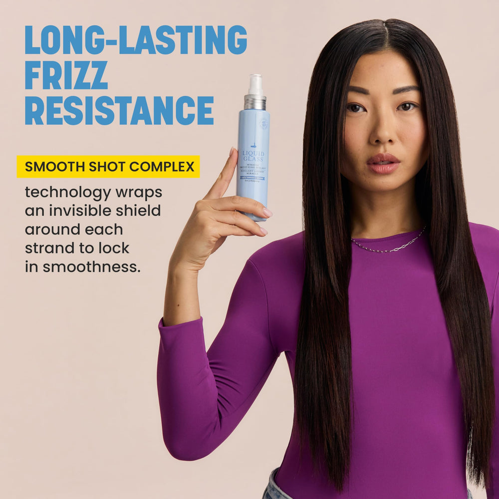 Drybar held in hand for scale showing 6.4 oz size and travel convenience