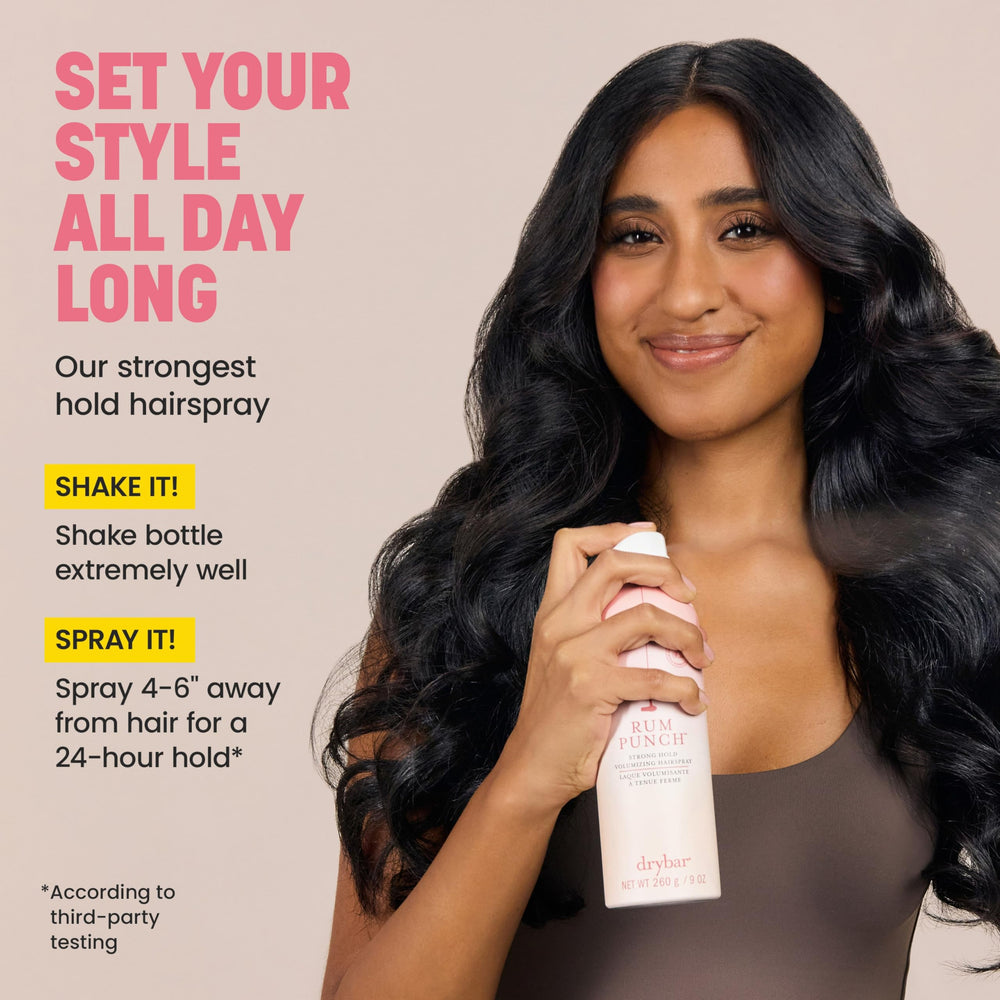 drybar product held in hand to show scale and 9 oz travel-friendly size
