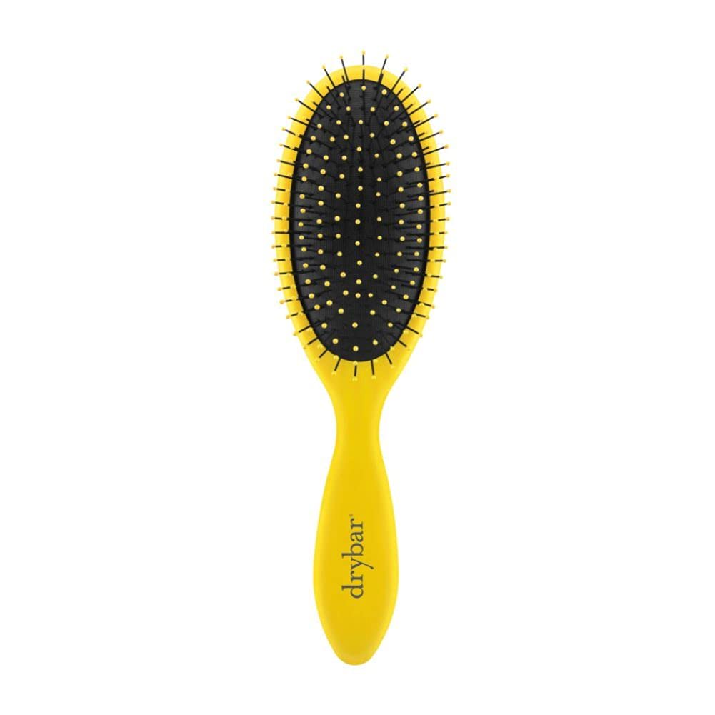 Drybar Super Lemon Drop front view showing shape and soft-touch grip for comfortable detangling