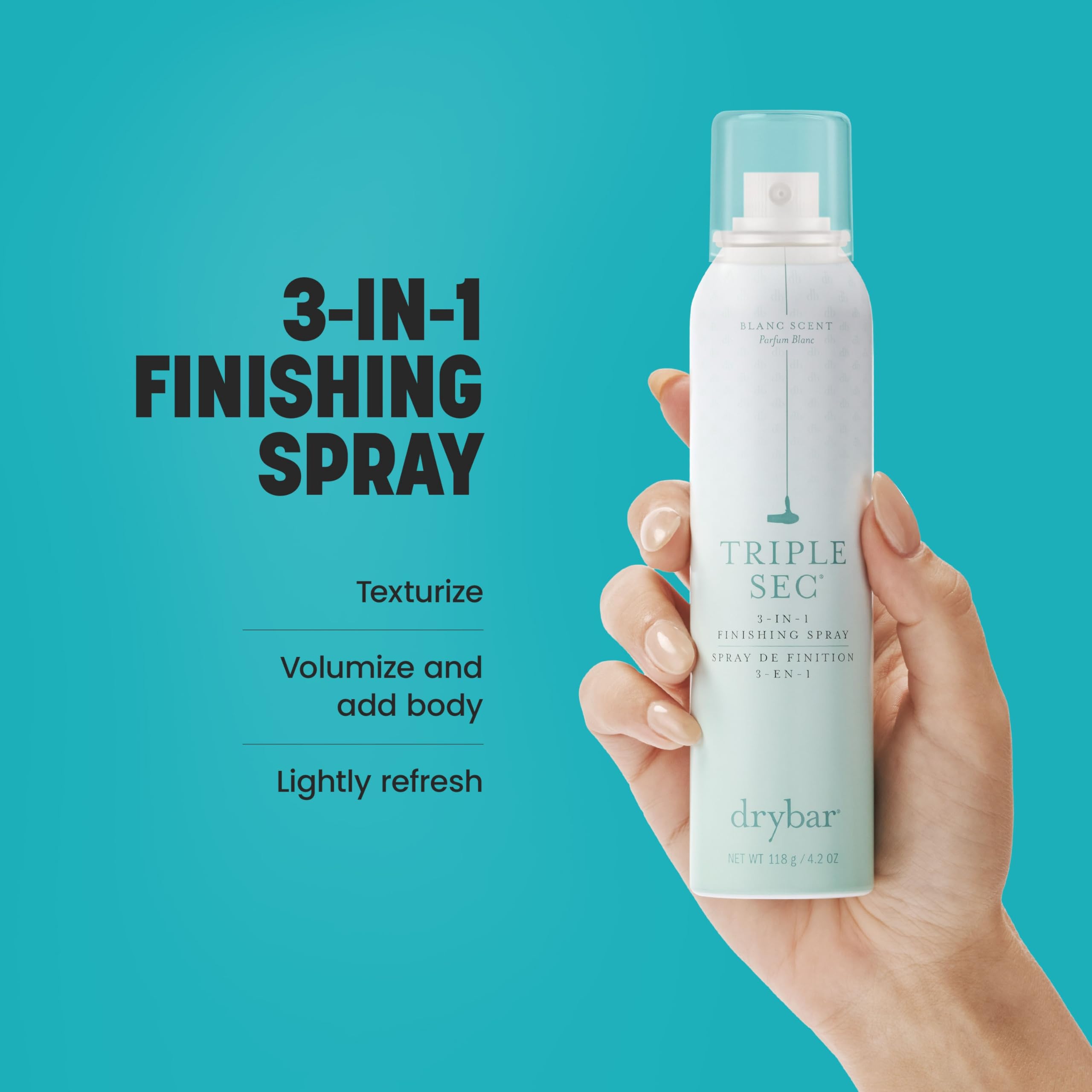 Drybar Triple Sec mist in air demonstrating airy spray for instant texture