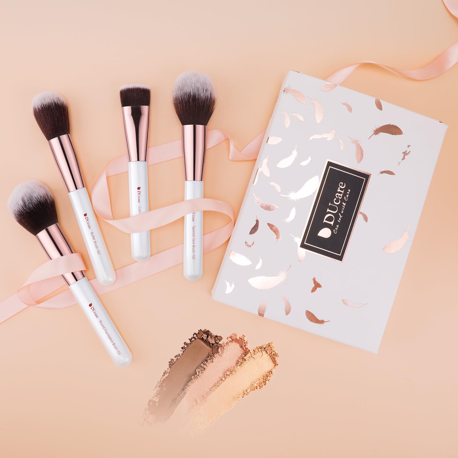 DUcare brush applying foundation showing smooth, even coverage