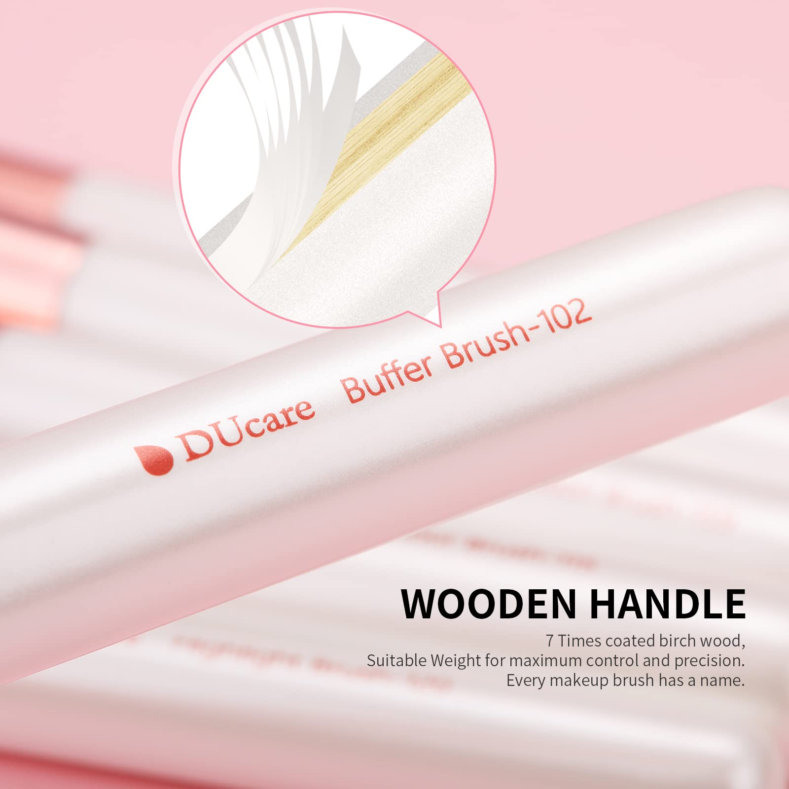 DUcare brushes in hand for scale showing compact, travel-friendly size