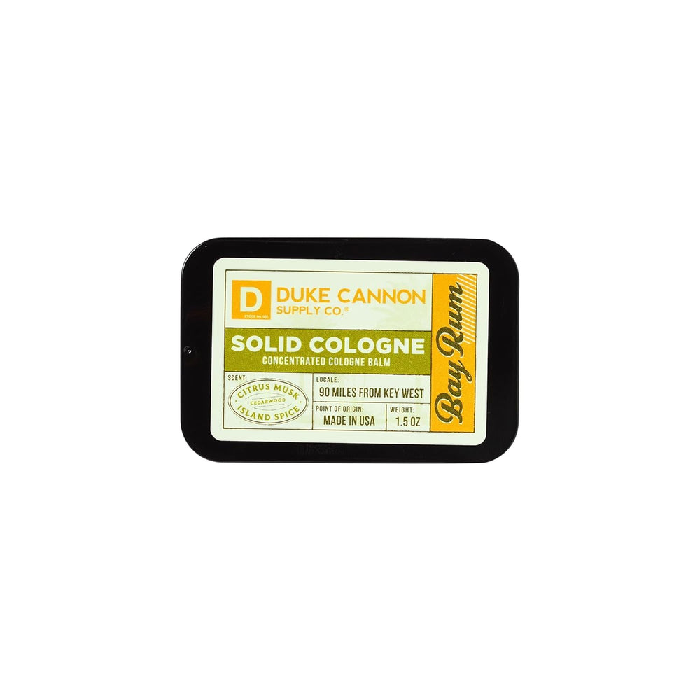 Duke Cannon fingertip applying balm demonstrating precise, no-mess use benefit