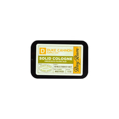 Duke Cannon fingertip applying balm demonstrating precise, no-mess use benefit