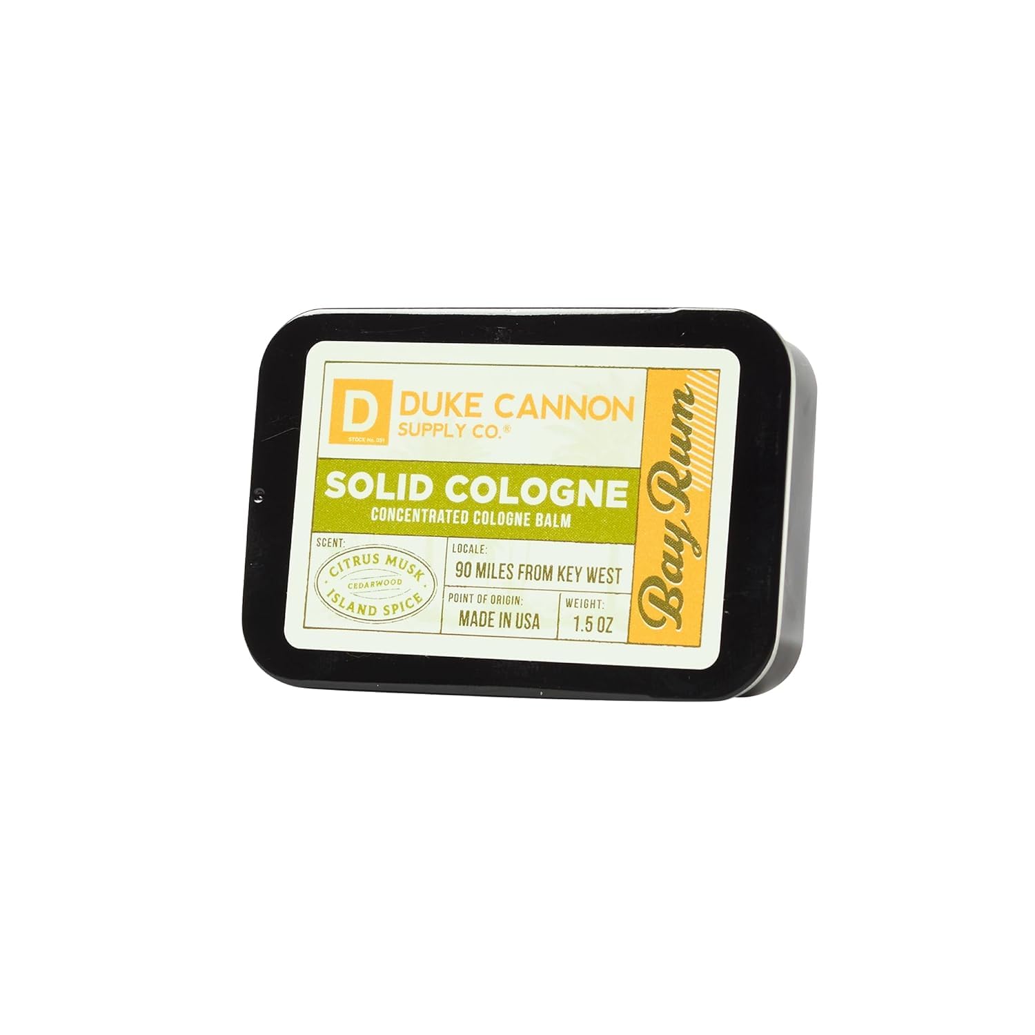 Duke Cannon tin next to credit card showing compact size and portability benefit