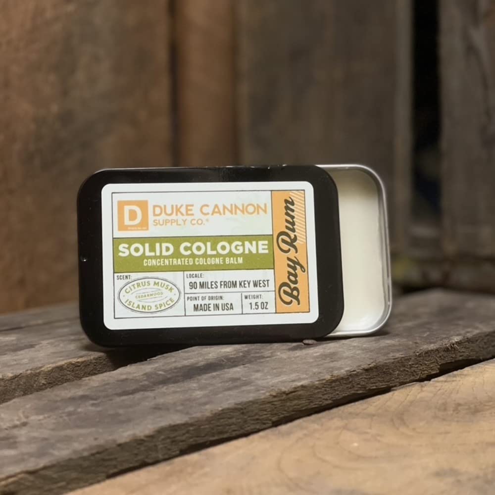 Duke Cannon tin side label displaying scent info and durable packaging benefit