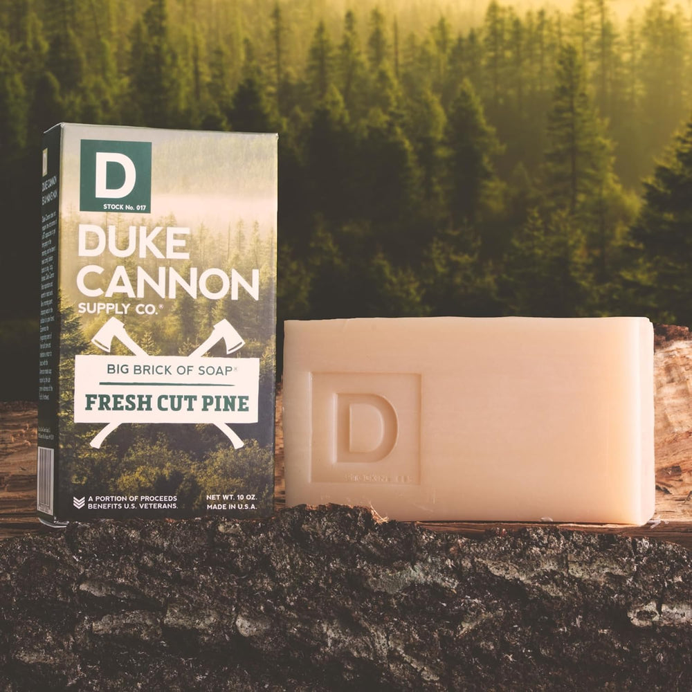 Duke Cannon bar beside ruler showing large 10 oz size for long-lasting use