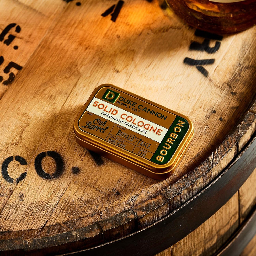 Duke Cannon tin in pocket showing compact size and travel convenience
