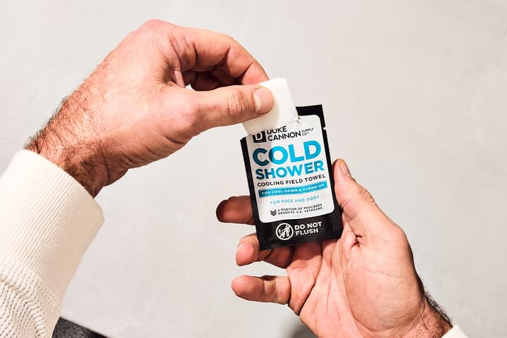 Person using a Duke Cannon wipe for post-workout cooling and quick refresh
