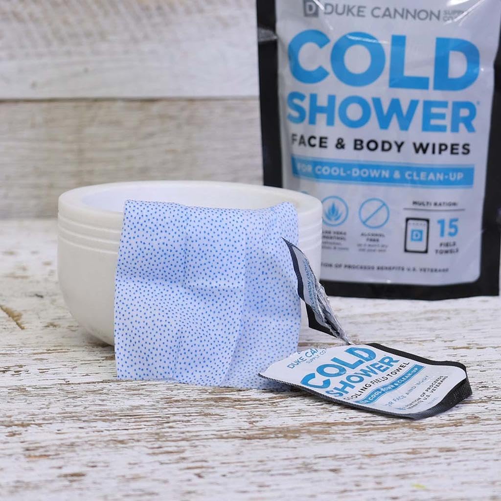 Duke Cannon towel being used post-workout to cool and clean skin