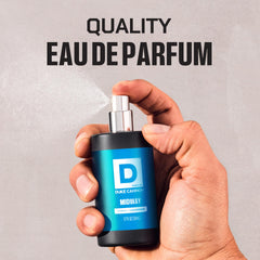 Duke Cannon bottle held in hand demonstrating Midway travel-friendly size