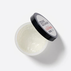 Duke Cannon pomade texture close-up showing smooth matte consistency