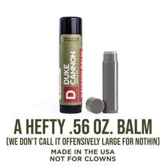 Duke Cannon tube next to standard lip balm illustrating larger size and longer use