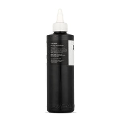 Dynamic Color black ink pouring to show smooth texture and consistent flow