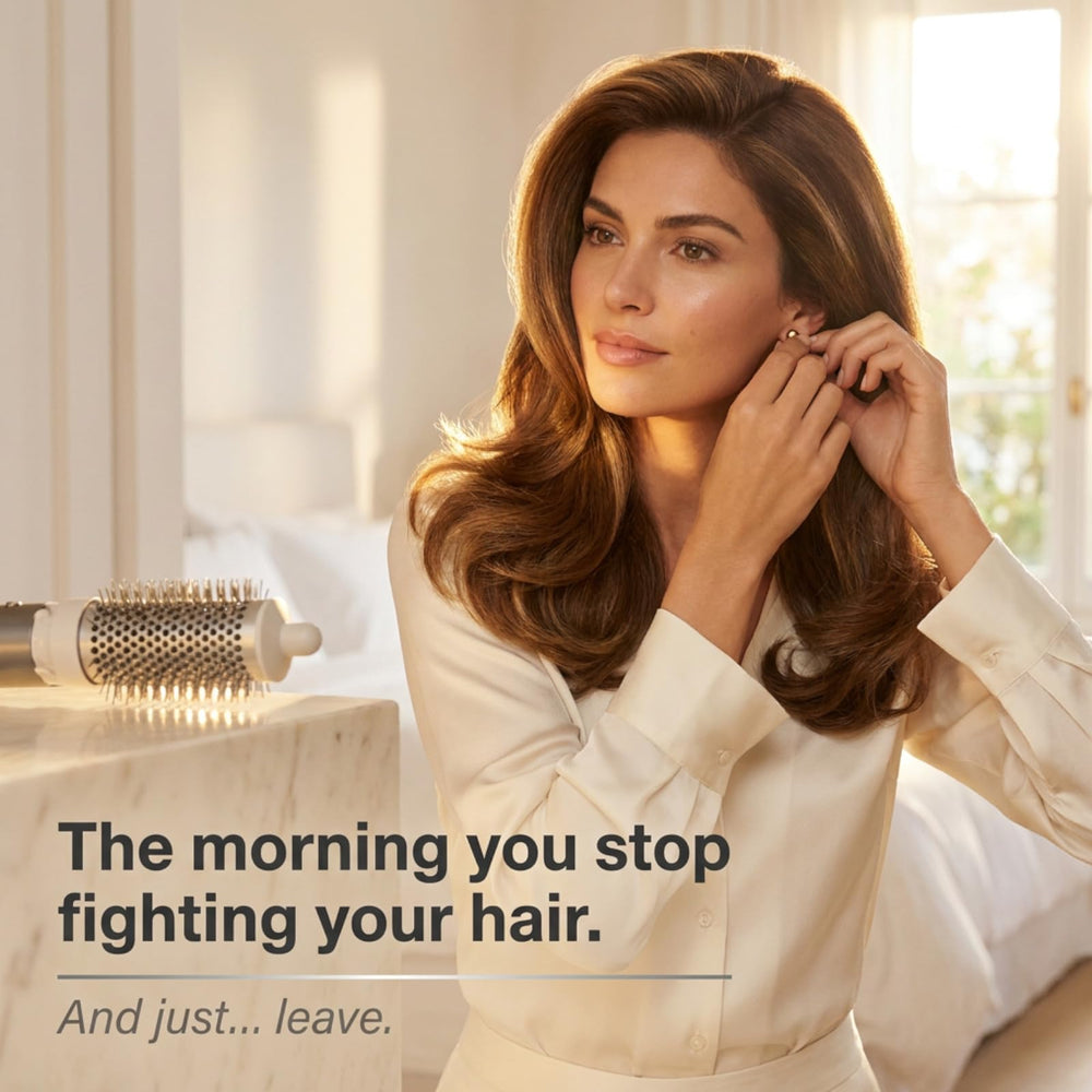 DyniCasa brush in use creating voluminous blowout on medium-length hair