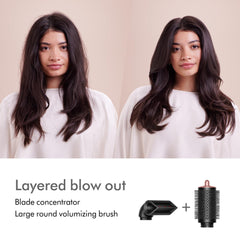 Hand holding Dyson Blade concentrator to show scale and easy handling benefit