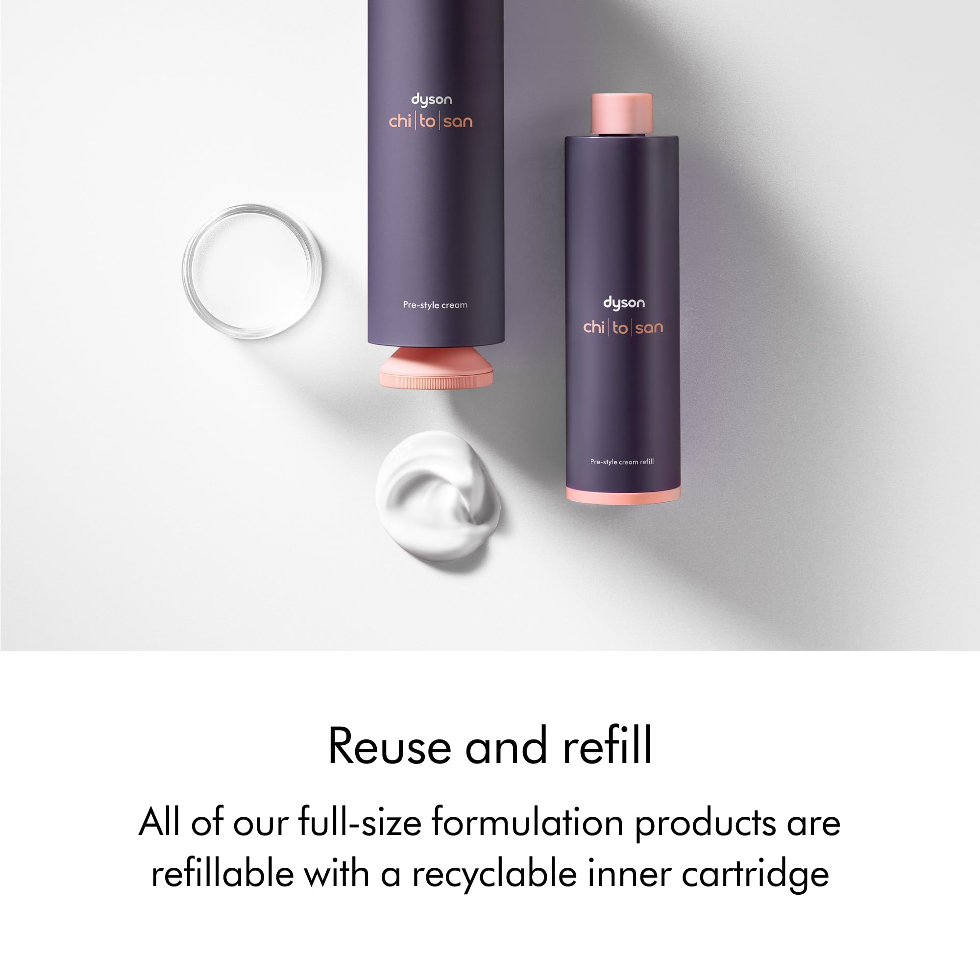 Dyson 100ml bottle held next to hand showing compact travel-friendly size