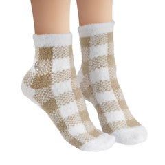 Earth Therapeutics socks beside ruler demonstrating fit and size for most adults benefit